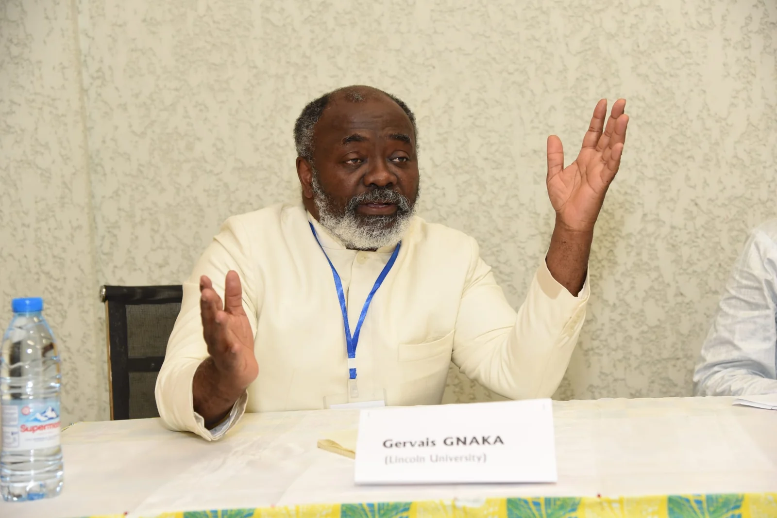 Dr. Gnaka Lagoke speaking during a panel discussion